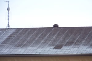 frost ghosting on shingled roof